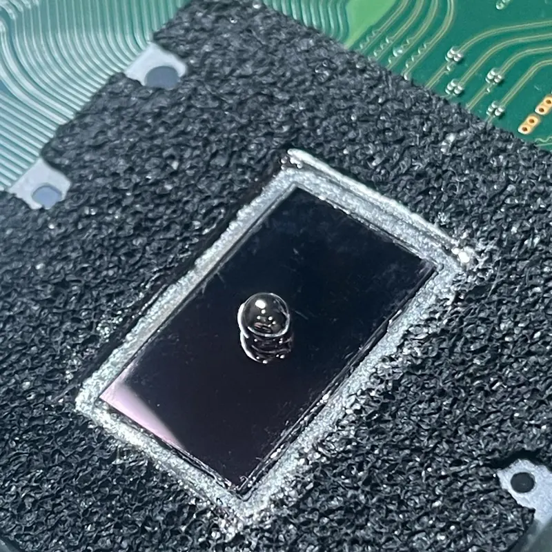 PS5 processor with fresh liquid metal applied during APU service